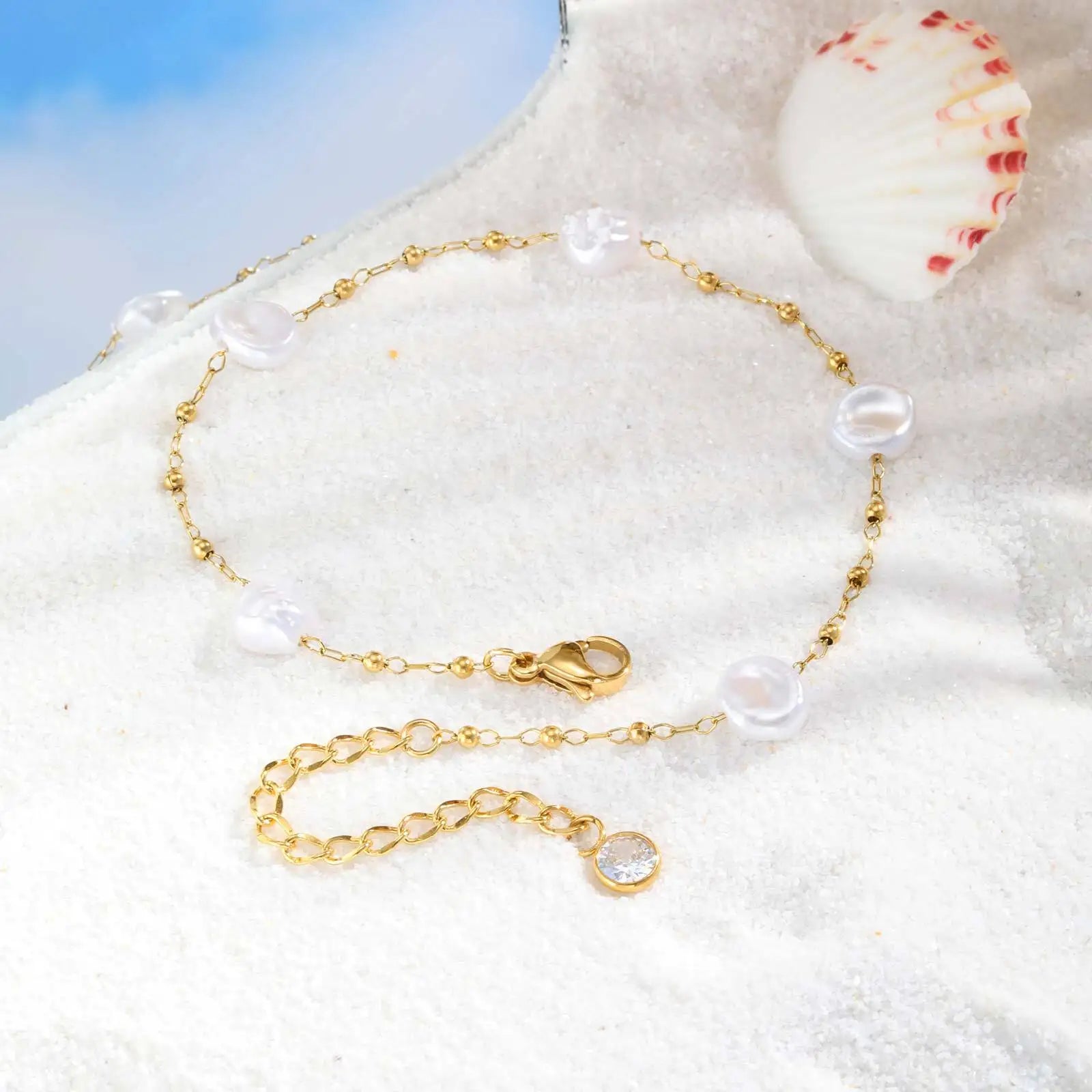 Tornozeleira Dourada com Pedras Barrocas – Charme Natural e Sofisticação Leve